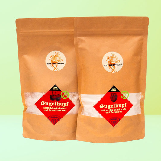 Zwei Glutenfreie Gugelhupfe mit Erdbeere und Kirsche mit Schokolade Backmischungen